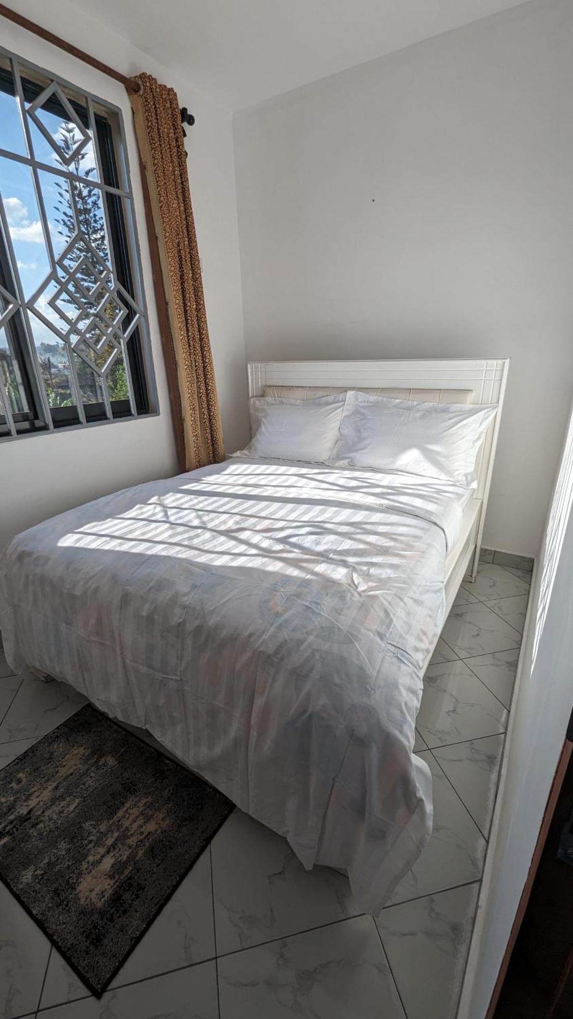 Mufasa City Hostel And Apartments Arusha Quarto foto